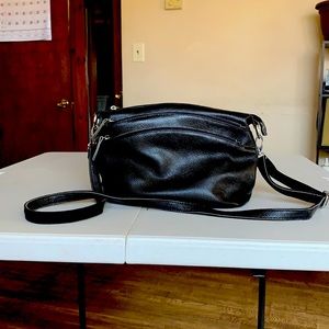 Black leather messenger bag.